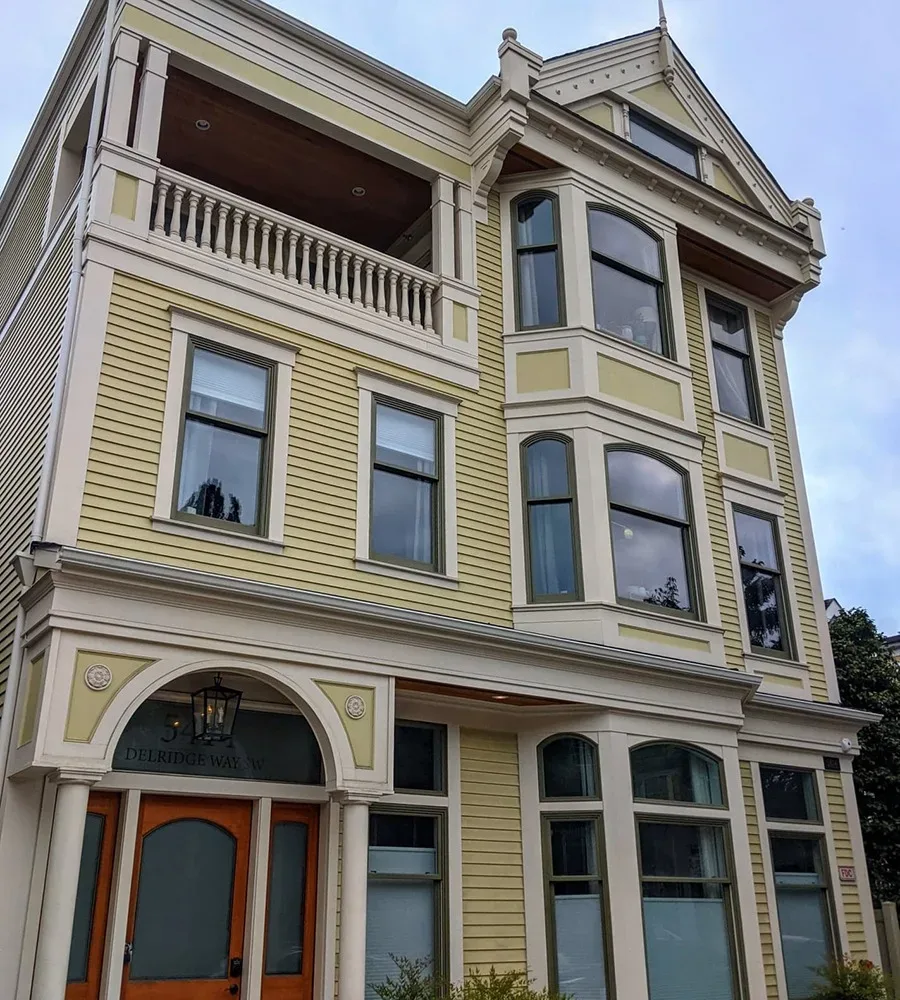 A fake Victorian house with three stories and a nice patio