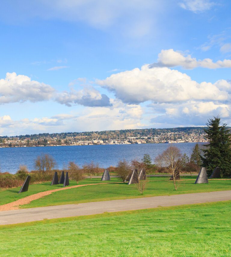 The scenic landscape of Magnuson Park, Seattle, Washington state, USA. View of Lake Washington with John T. Young's "The Fin Project: From Swords into Plowshares" at Magnuson Park
