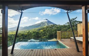 pool at tented camp in Costa Rica in front of mountain