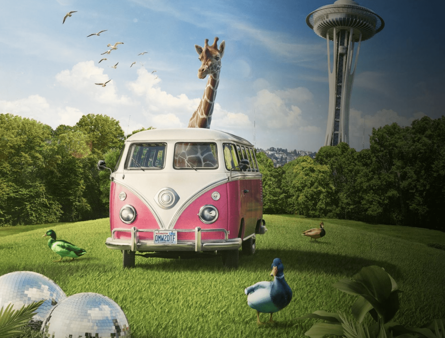A giraffe driving a hippie van next to some ducks and disco balls in the Fischer Pavilion at the Seattle Center with the Space Needle in the background