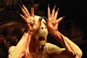 A freaky alien with eyeball hands from Guillermo del Toro's Pan's Labyrinth