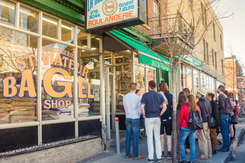 people outside bagel shop in Montreal Canada