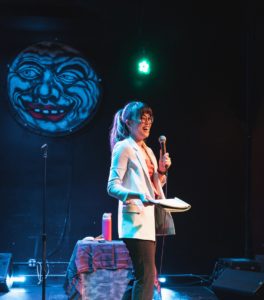 Stephanie Nam performs at a Men Aren't Funny show