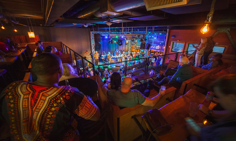 The interior of Nectar Lounge, with people watching a live jazz band