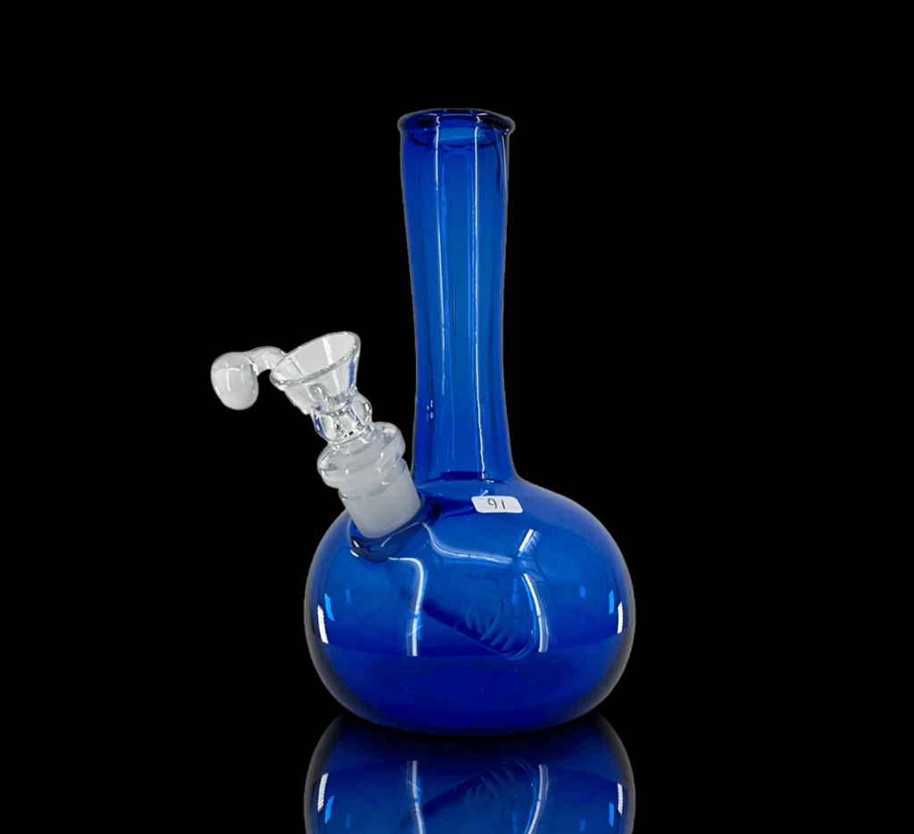 A blue cannabis glass piece created by Special K