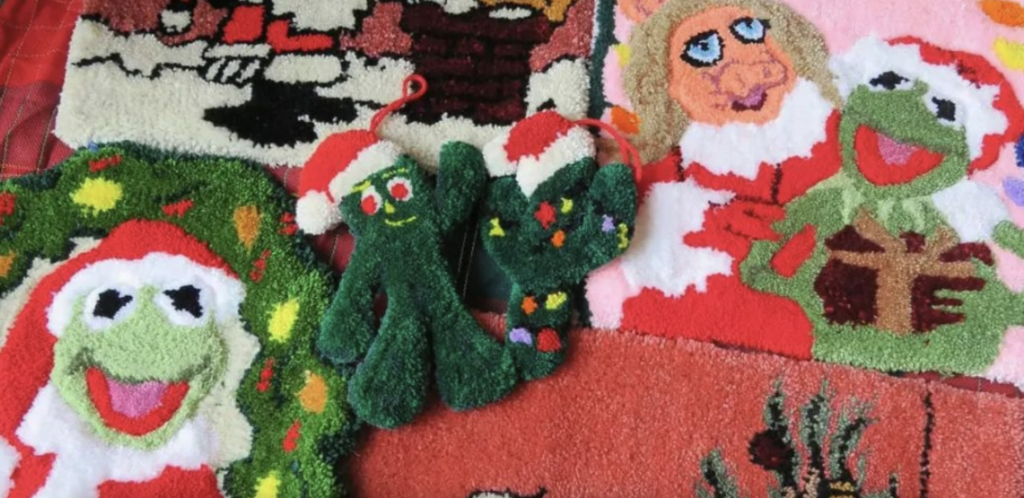 A collection of tufted holiday themed rugs featuring Kermit, Miss Piggy, Snoopy, and Gumby
