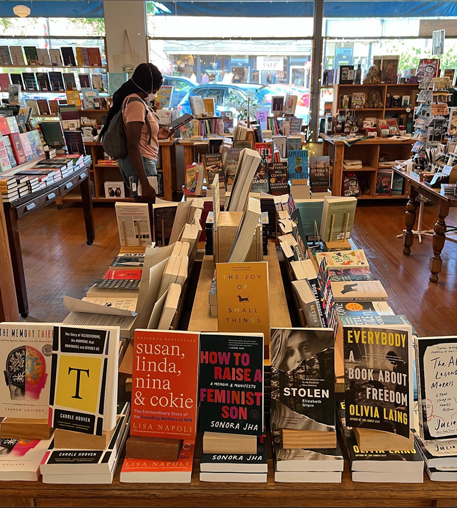 A large display of books inside Eagle Harbor Book Co.