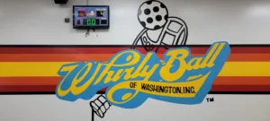 WhirlyBall sign on a wall