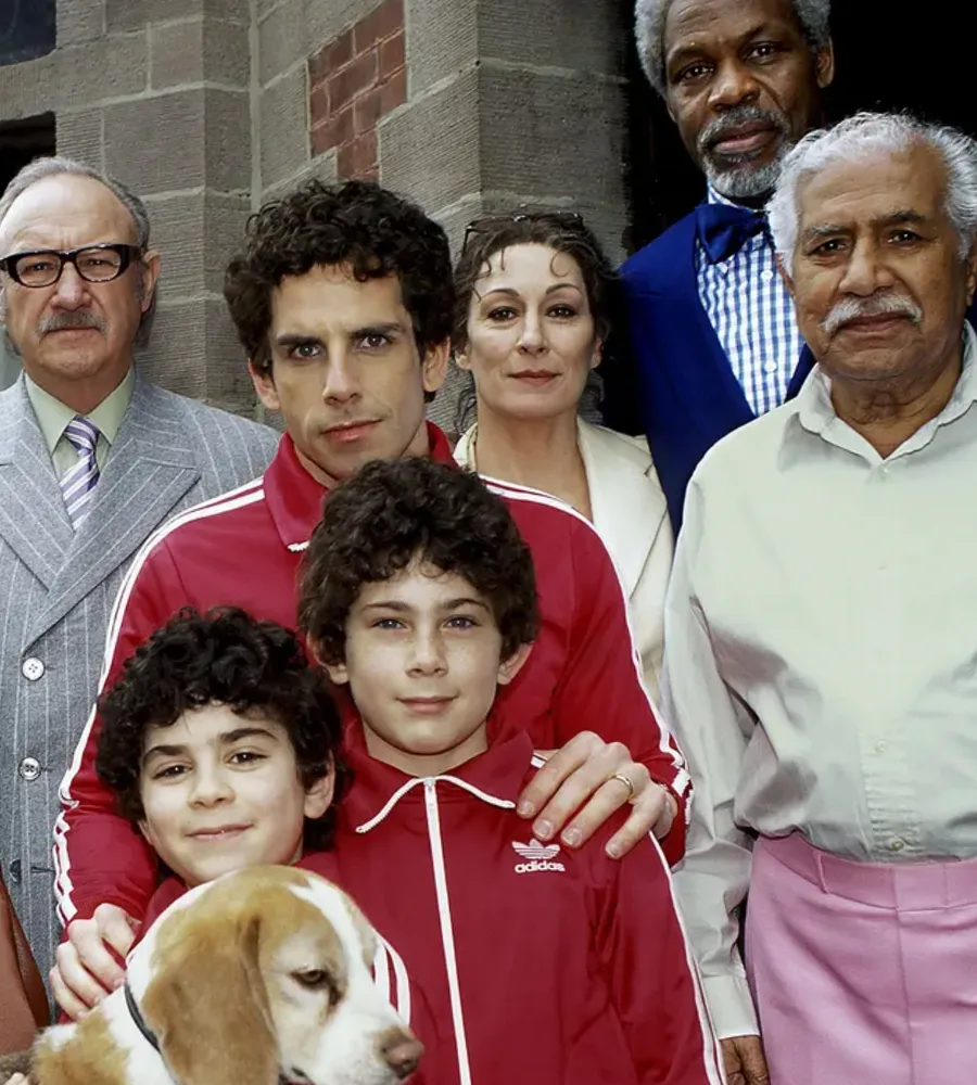 A cast shot of The Royal Tenenbaums with Ben Stiller at the center in a red jumpsuit