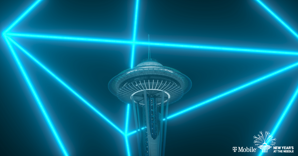 Cool blue lasers shoot around Seattle's Space Needle during a virtual New Year's Eve show in 2021.