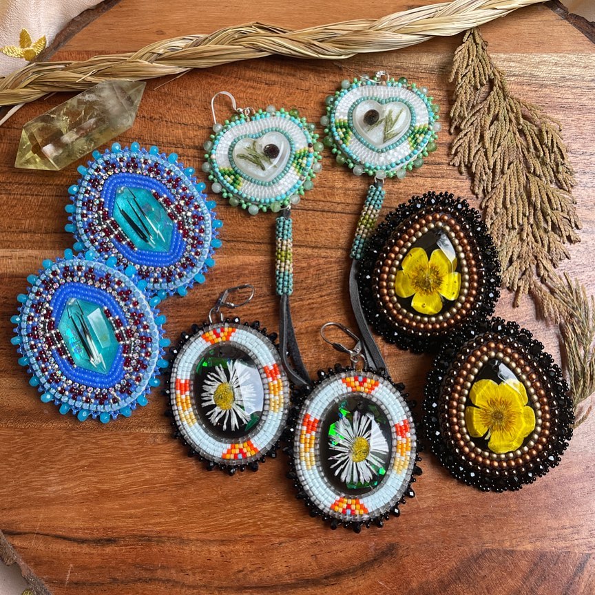 A display of handmade floral earrings from Kolbi Jane Design