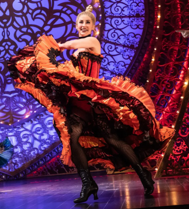 A dancer twirls in the live stage production of Moulin Rouge at The Moore.