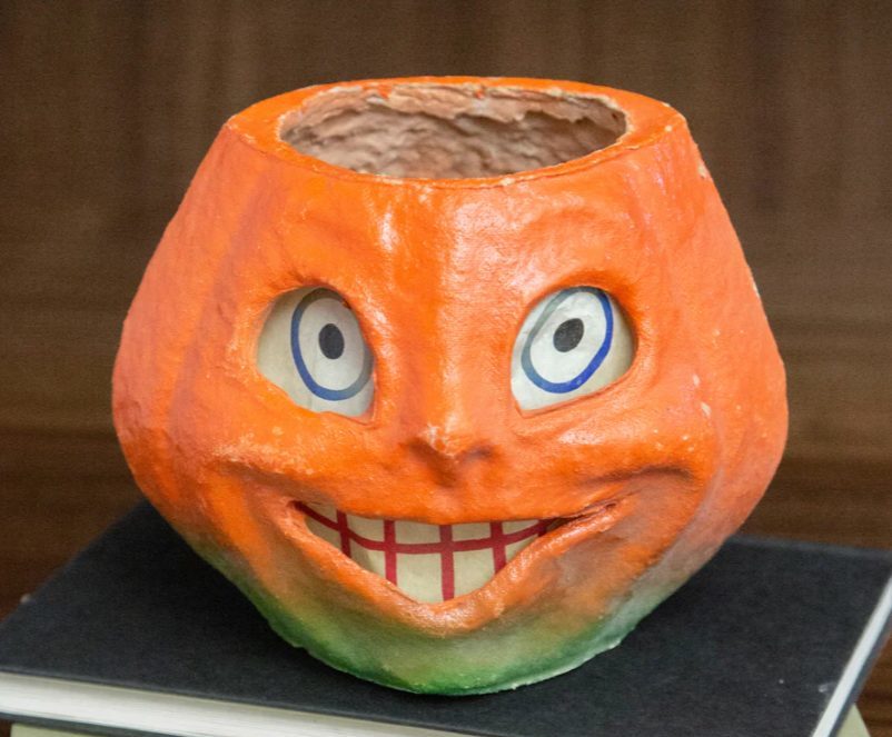 A cute but creepy pumpkin candle holder