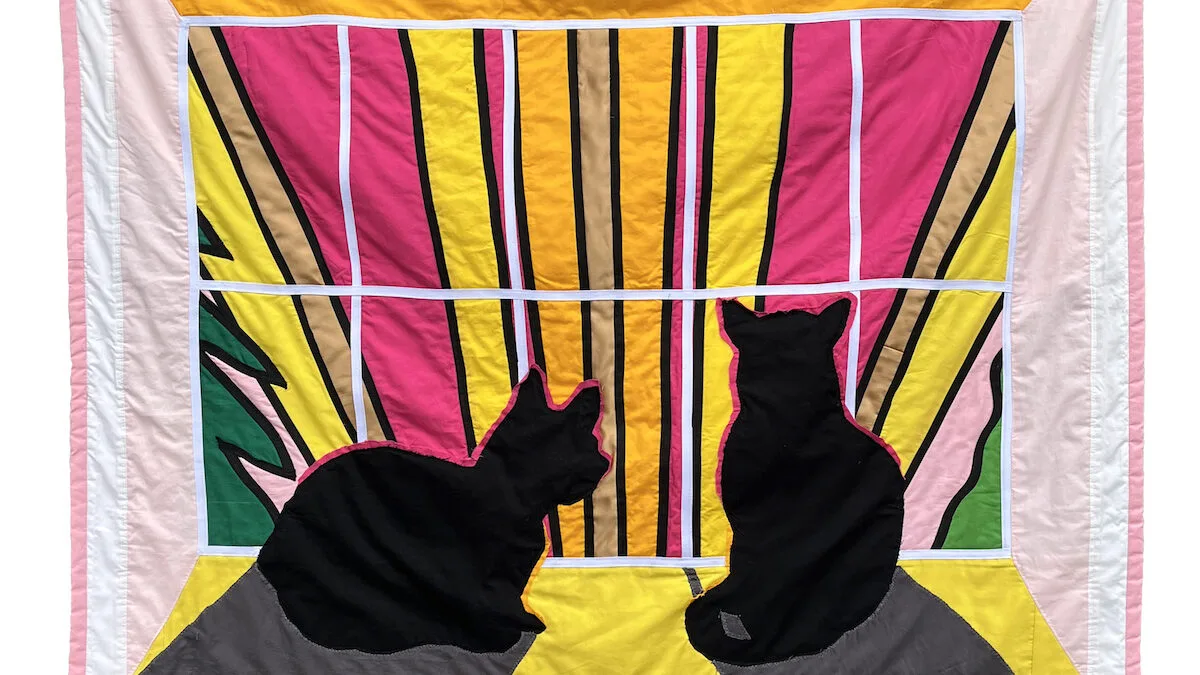 "WHEN I FEEL ALIVE I TRY TO IMAGINE A CARELESS LIFE, A SCENIC WORLD WHERE THE SUNSETS ARE ALL BREATHTAKING" by Joey Veltkamp. Two cats are perched on the windowsill as hot pink, orange, and yellow rays of the sunset play out dramatically in front of them.