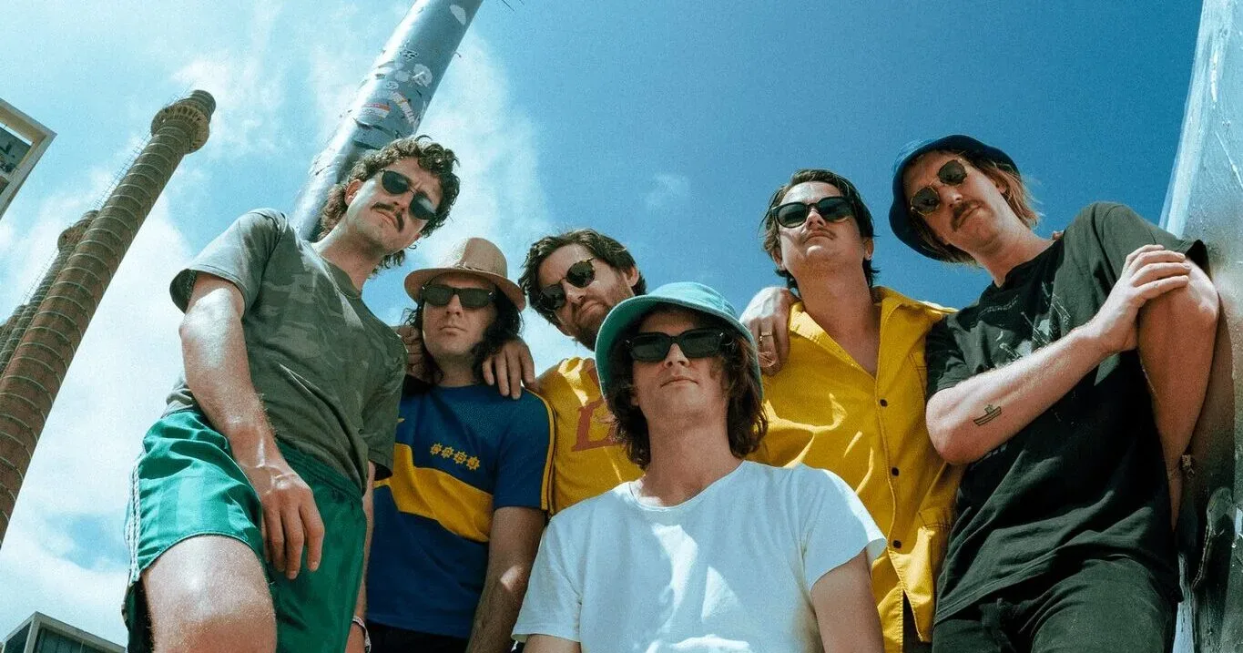 The band King Gizzard and the Lizard Wizard posing together