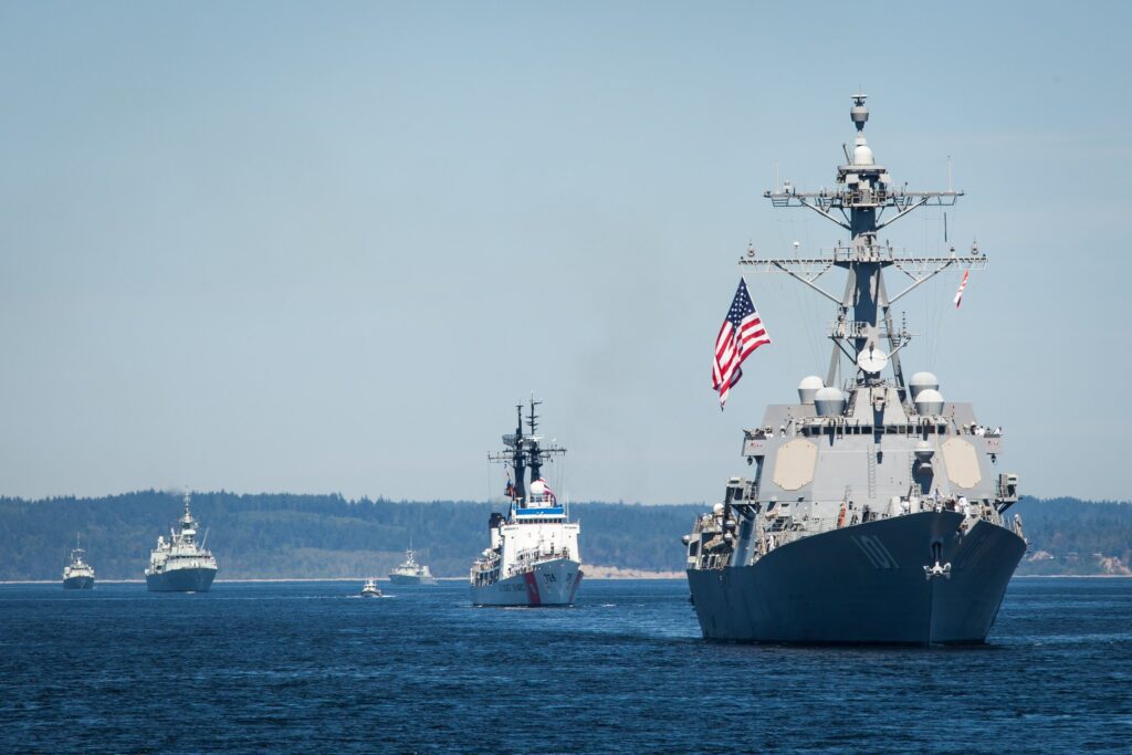 A line of ships sails into Seattle for Fleet Week