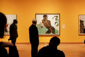 People explore Amoako Boafo's exhibit, Soul of Black Folks at Seattle Art Museum.