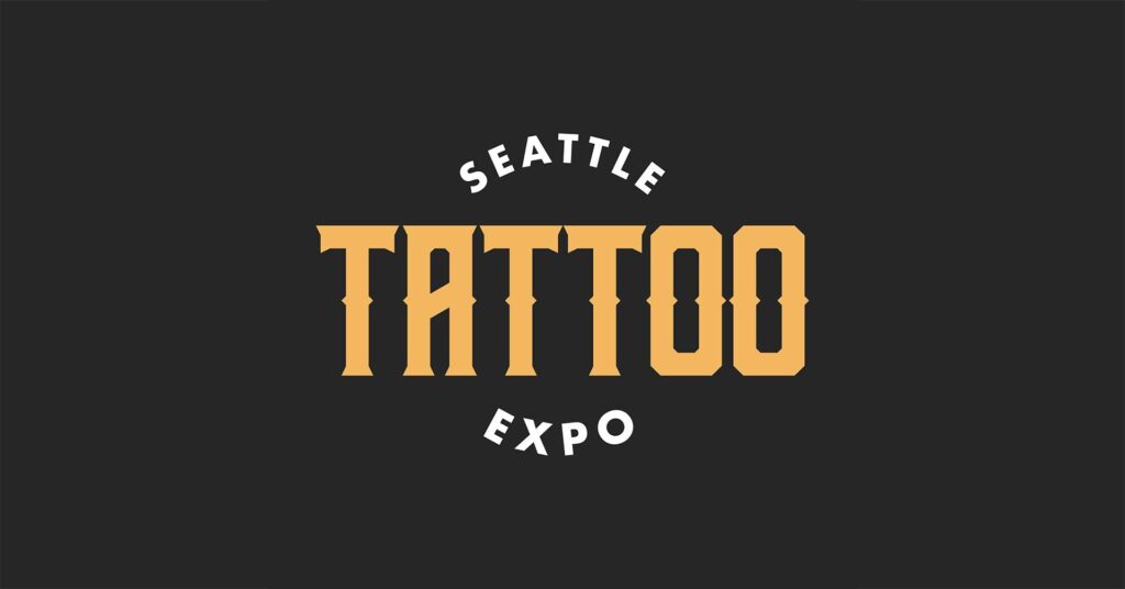 Seattle Tattoo Expo's logo in dark grey and yellow