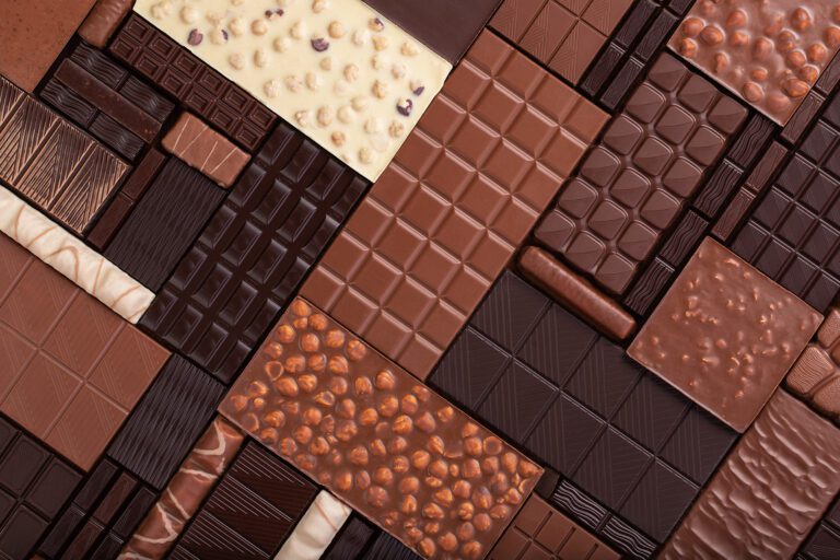All kinds of chocolate bars arranged in a pattern