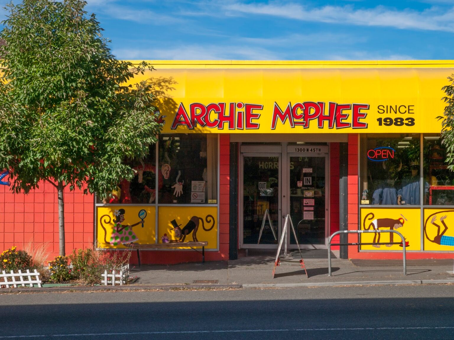 The storefront of Archie McPhee in Seattle, with its classic bright yellow and bright red colors.
