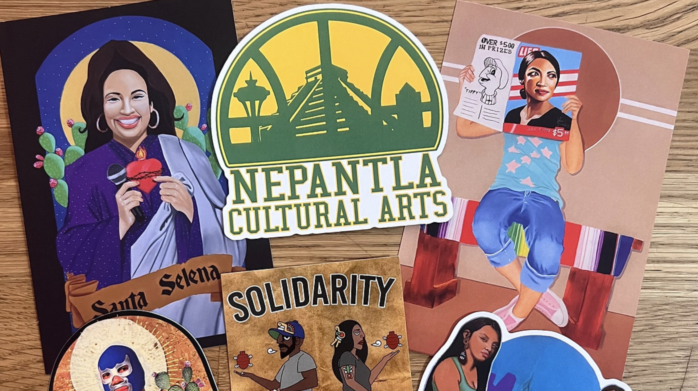 A collection of stickers available at Nepantla Cultural Arts Gallery