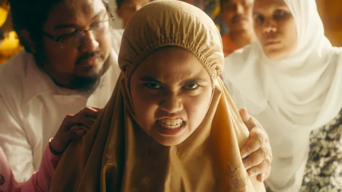 In this surreal Malaysian coming-of-age drama with teeth, rebellious 12-year-old Zaffan has hit puberty early, except her physical and behavioral changes seem to be anything but normal, terrifying her family and her patriarchal Muslim school. It seems to be something…monstrous.