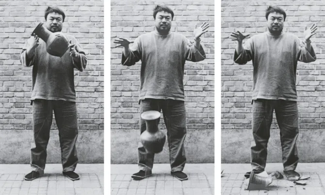 A sequence of three black and white photographs showing a performative act: first, someone holding a ceremonial urn, then standing with raised hands as the urn sits below, and finally with the urn broken on the ground. The figure stands against a brick wall wearing casual clothes.