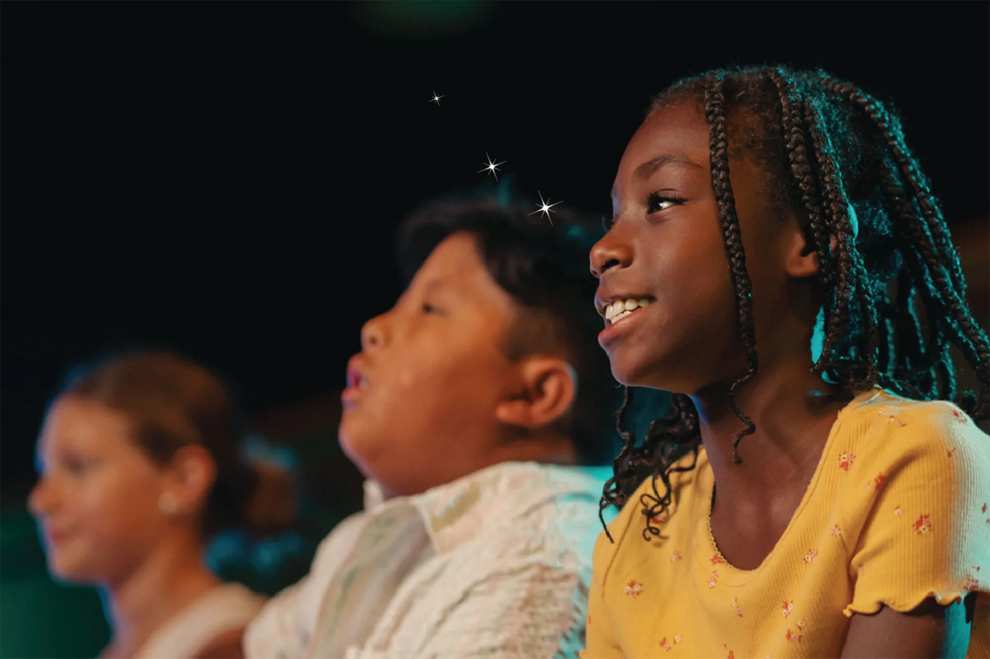 Kids watching Seattle Children's Theatre