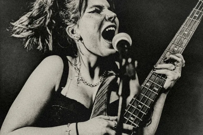 Rock girl with a guitar