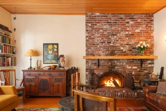 Cozy cottage interior with crackling fire