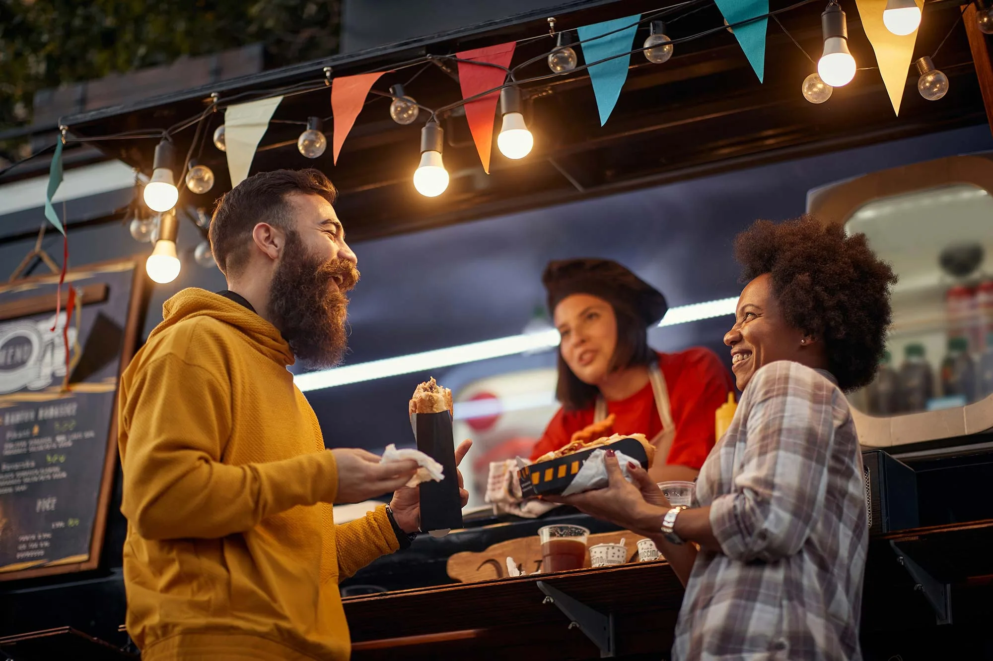 Couple ordering at a food truck