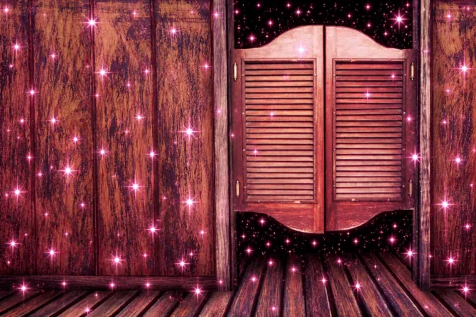 Wooden saloon doors with pink sparkles