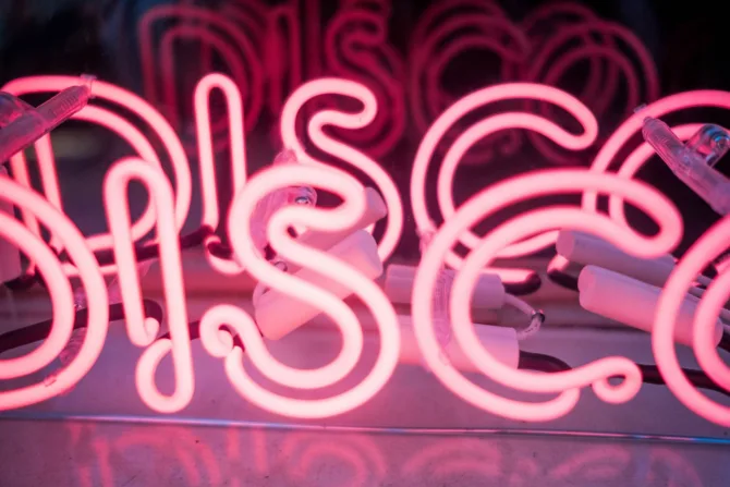 Pink neon disco sign