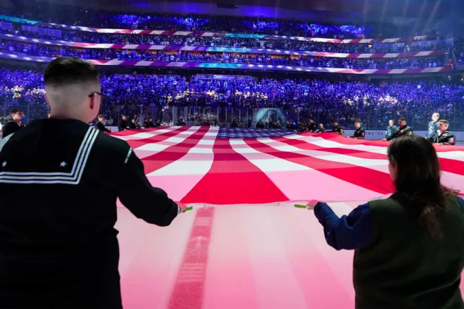 Service members at a Seattle Kraken game